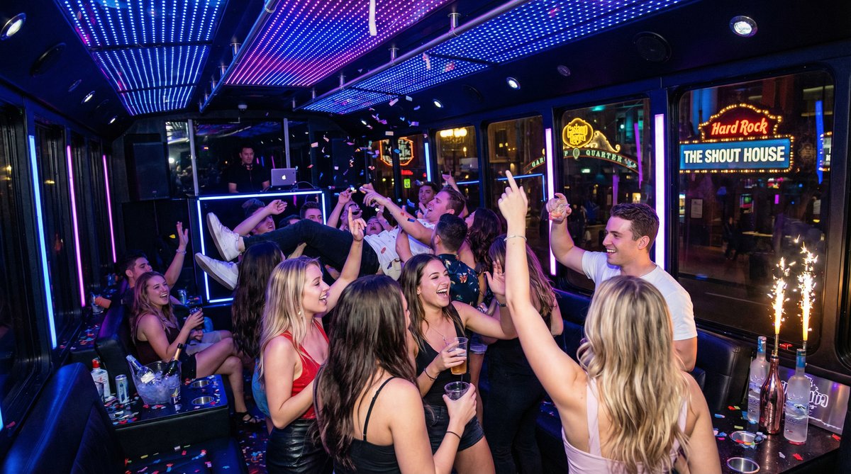 VIP group enjoying San Diego summer nightlife on a luxury party bus